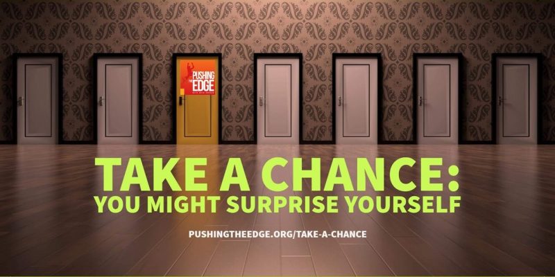 Take a chance Text - Take a chance you might surprise yourself. Backdrop row of doors with one door being a different colour